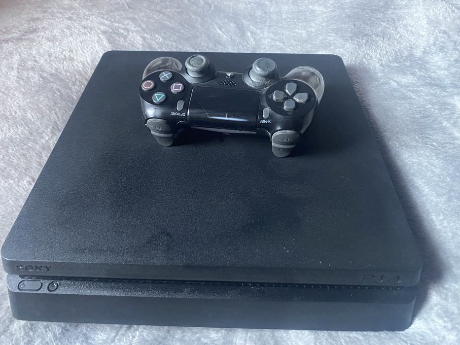 PS4 Slim 500 GB + manetă originală+ 6 jocuri