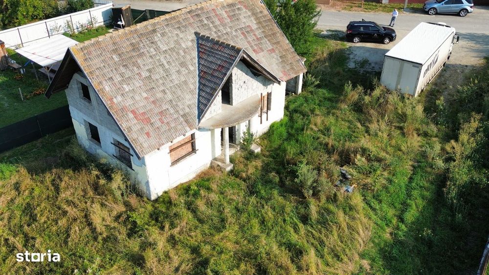 Casa la rosu Lunca Calnicului ,Prejmer,Brasov, teren 1000 mp.