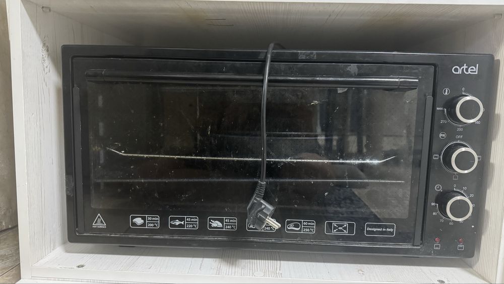Духовка artel.
