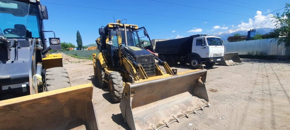 Услуги экскаватора погрузчика 3в1 трактор