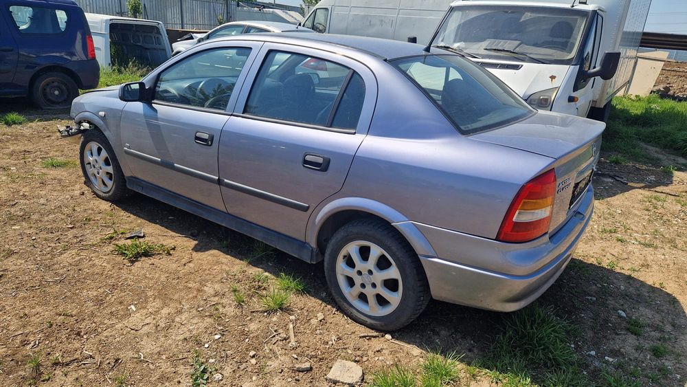 Opel astra G motor cutie viteze 1.6 electromotor usi usa portbagaj hayon roti jante aliaj volan airbag Scaune alternator faruri far pompa servo caseta