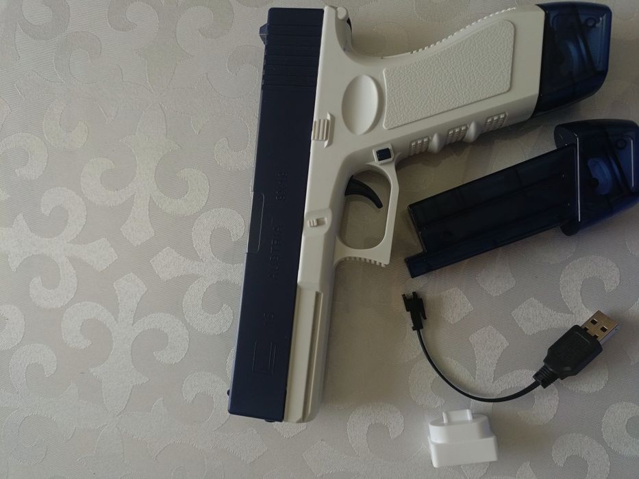 водяной пистолет игрушечный