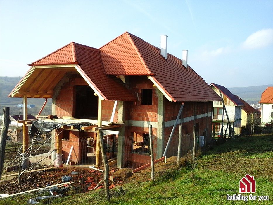 Executam lucrări în  construcții case în rosu și finisat