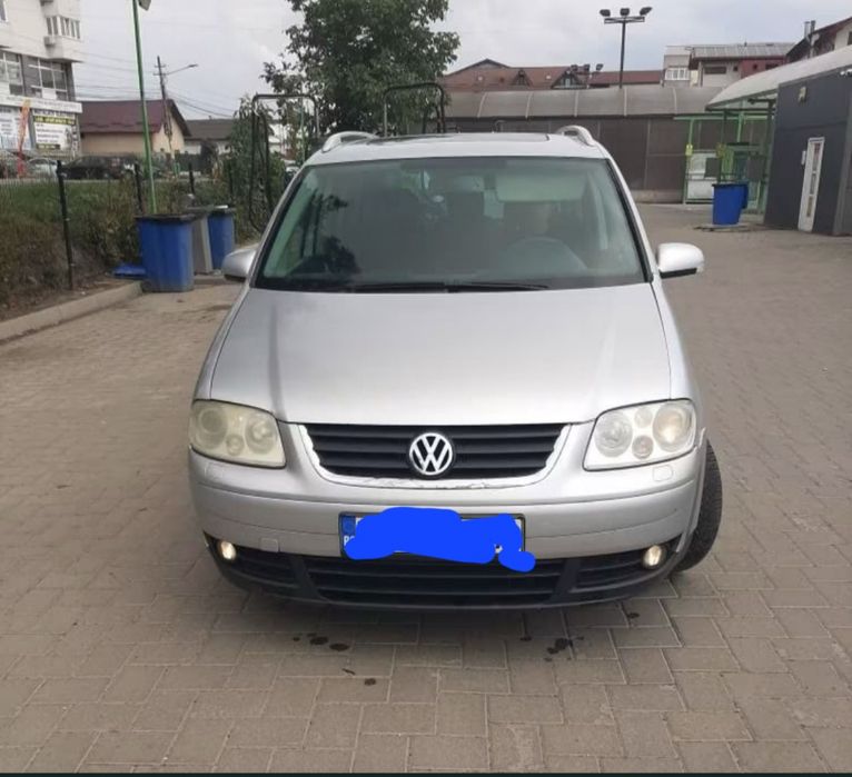 Vând volkswagen tuaran