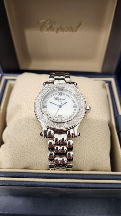 Золотые женские часы Chopard