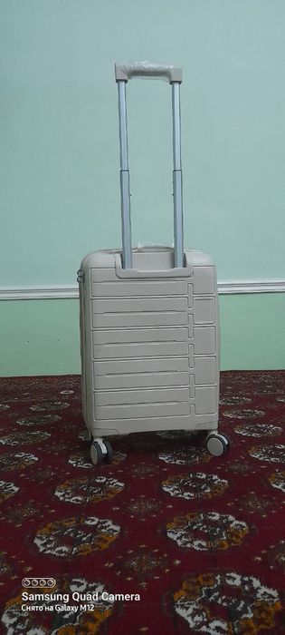 Tozo ishlatilmagan chamadon