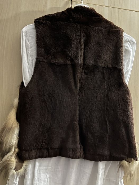 Страхотно късо спортно елегантен елек.