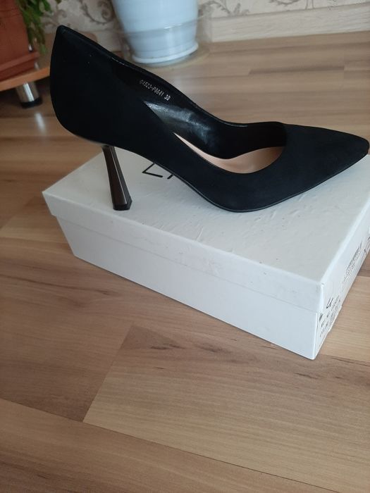 Продам туфли новые