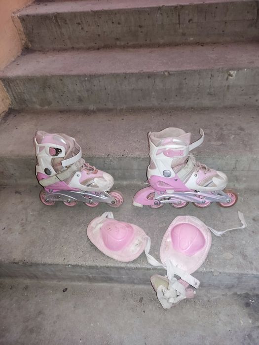 Роликовые коньки