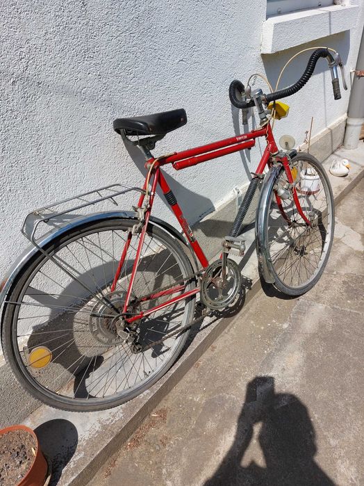 Bicicleta Semicursiera cu numeroase piese de schimb originale