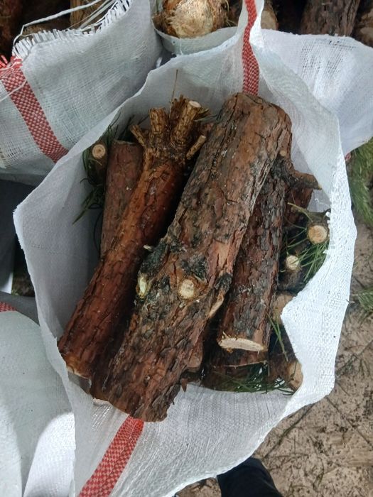 Готовые дрова в мешках