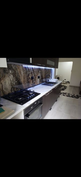 Apartament 2 camere  terasa mare( 30mp )și gara(boxa )