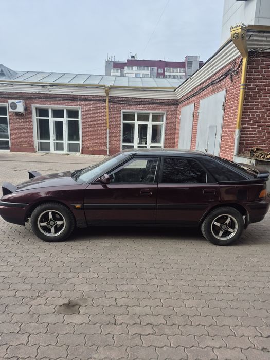 Продам Mazda 323F BG