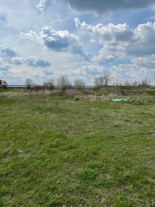 Vând/SCHIMB cu auto  imobil Teren 1000mp,intavilan,langa A2, CU sco