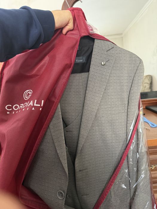 Костюм  бір рет пайдалылған