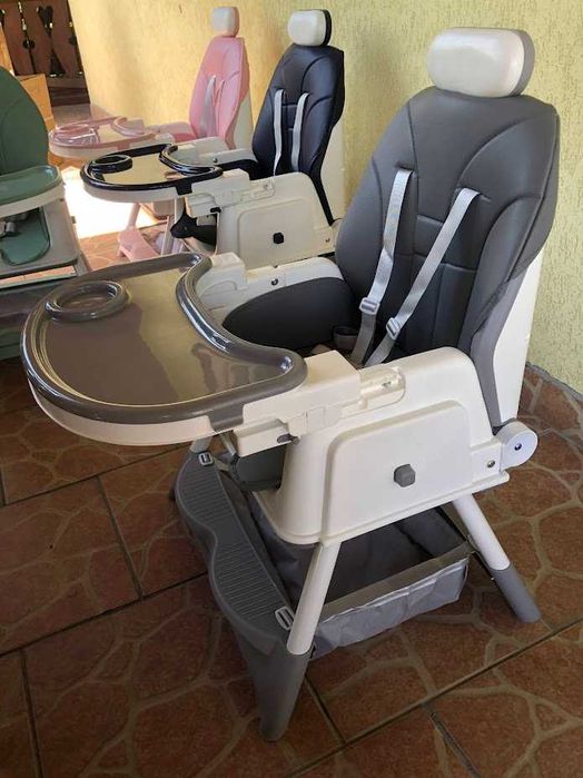 Scaun de masa bebe 4 in 1.Varsta 6-72 luni, Scaun inalt pliabil,4 roti silicon, 2 x Tava detasabila, Centura de siguranta in cinci puncte