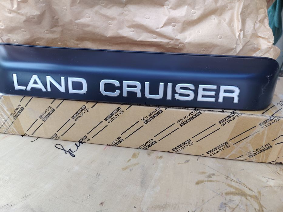 Land Cruiser 105 Деталь открывания  задних  дверей