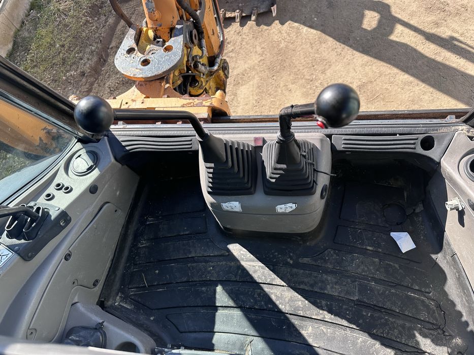 Buldoexcavator CASE 695 super R