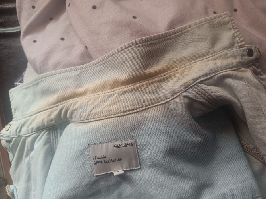 Geaca de blugi purtata