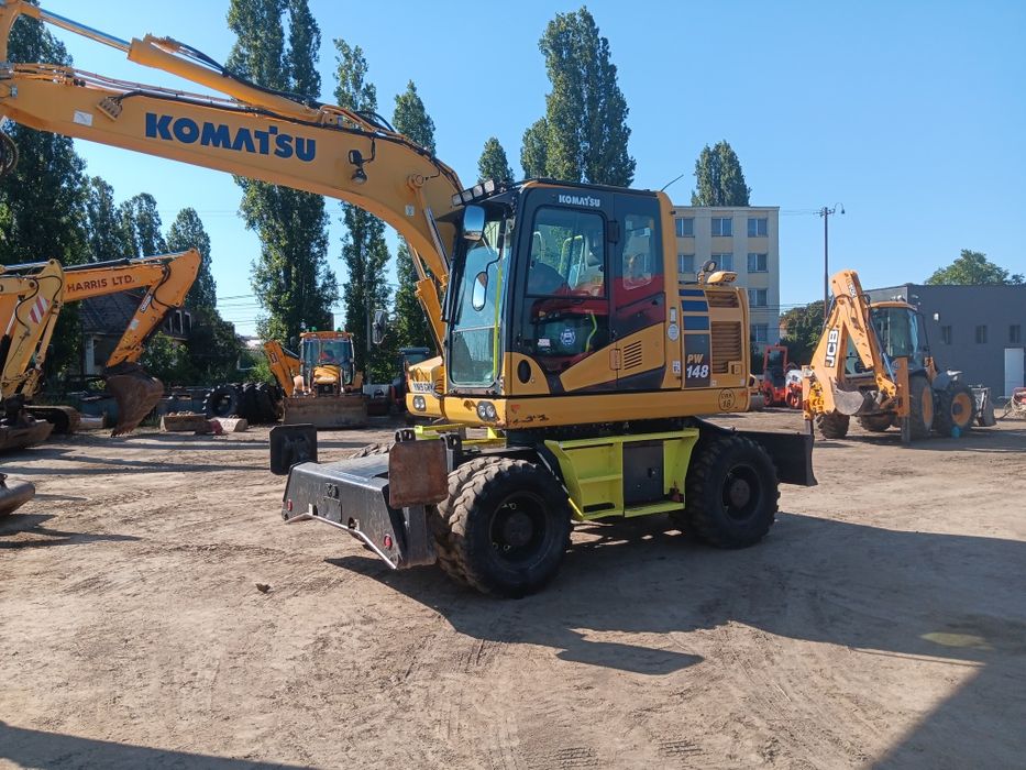 Vând sau schimb excavator komatsu PW 148