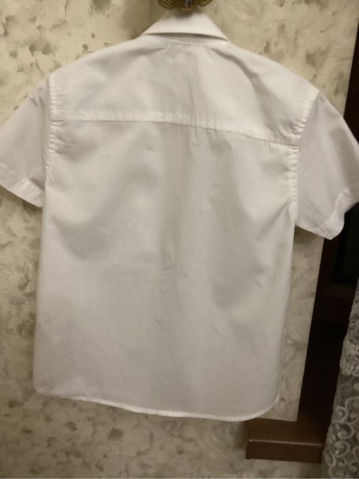 Белая рубашка на мальчикаLC WAIKIKI