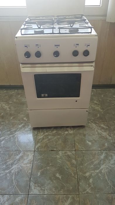 Газовая плита четырёхкомфорная