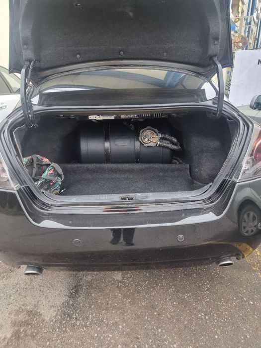 Nissan Altima L32 xolati zor propan 90 tali