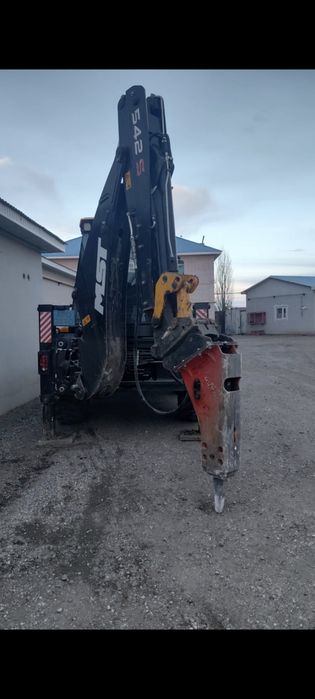 Услуги эксковатора-погрузчика