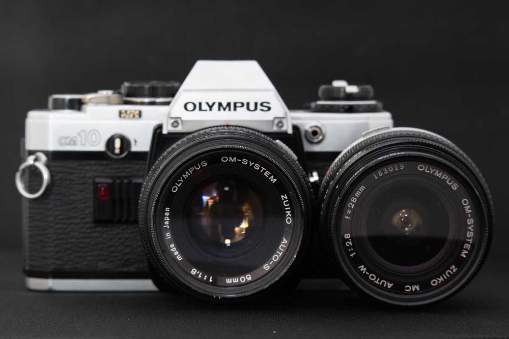 Olympus OM 10: Chat IA et accès PDF