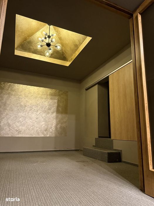 Apartament cu garaj, grădină, aer conditionat și centrală proprie