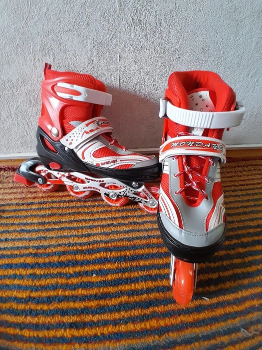 Роликовые коньки