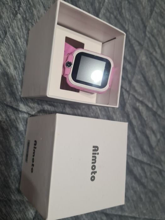 Продам  детские часы телефон