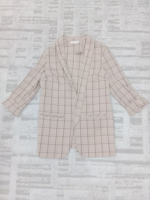 Пиджаки  женские