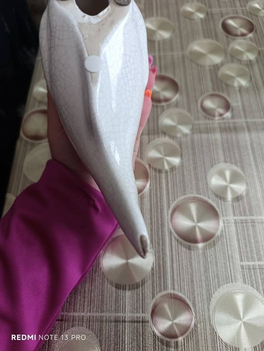 Стара статуетка на риба