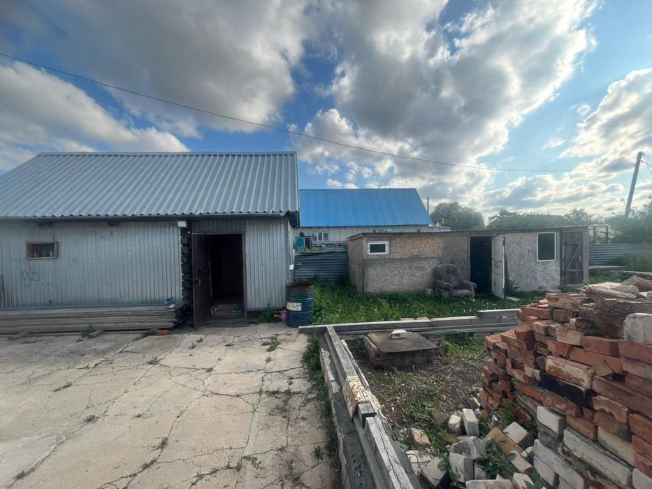 Продам участок не достроеным домом