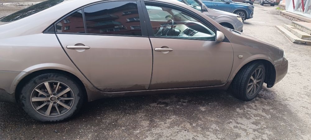 Nissan primera 2004 год