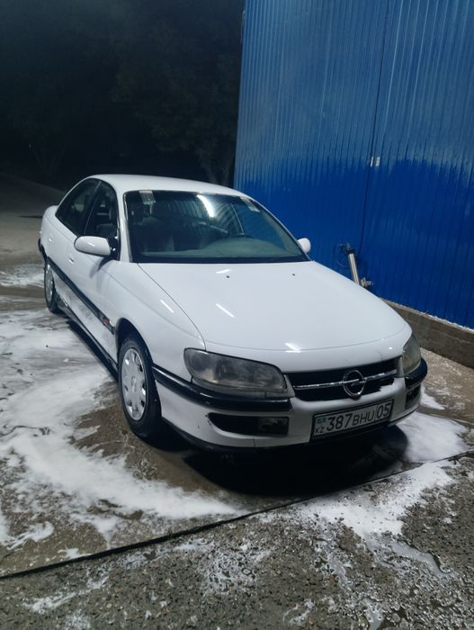 Опель омега б 2литра 300к