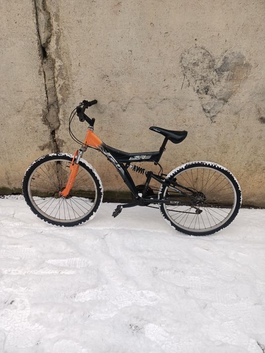 Vînd Bicleta de downhill sau de plimbări prin orasi sau pădure