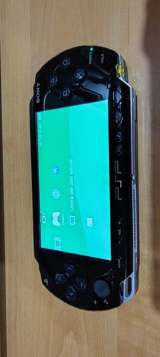 Husa + incarcarcator + Psp 1000 modat