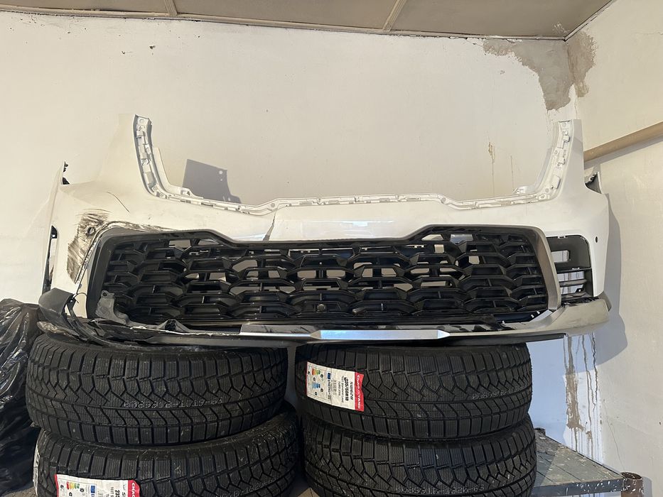 соренто 25 год бампер с решеткой