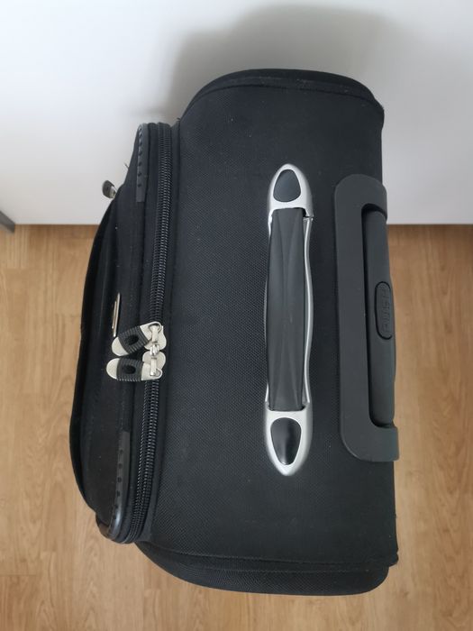 Kуфар с колелца 60 л. със забележка