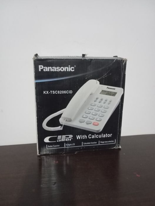 Стоционарный телефон с определителем