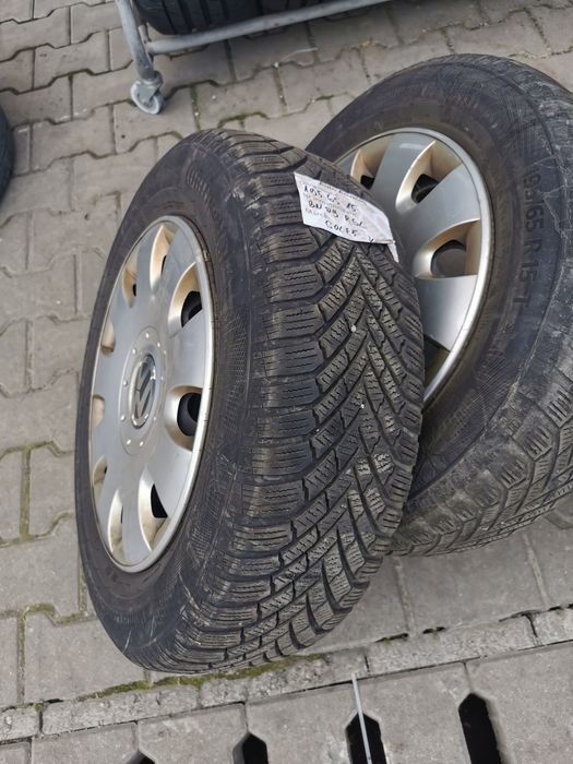 Jante de tabla pe 15'cu capace si cauciucuri continental de iarna