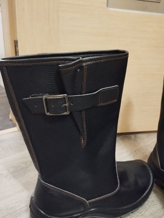 Продам новые Сапоги