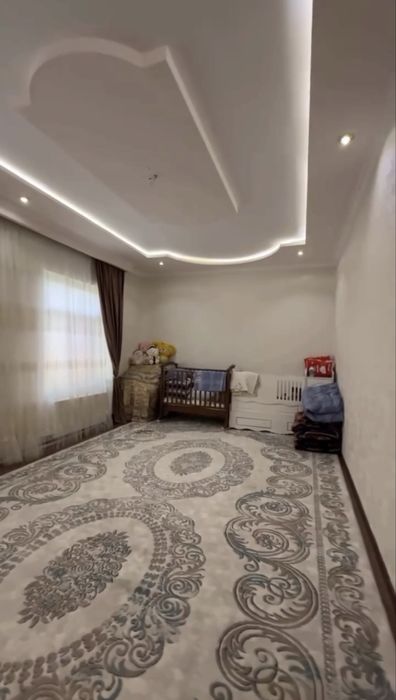 Кибрай туманида ховли учаска сотилади 8 сотих 5 та хона