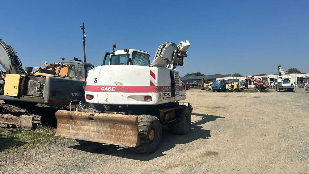 Dezmembrez excavator pe roti Case WX145