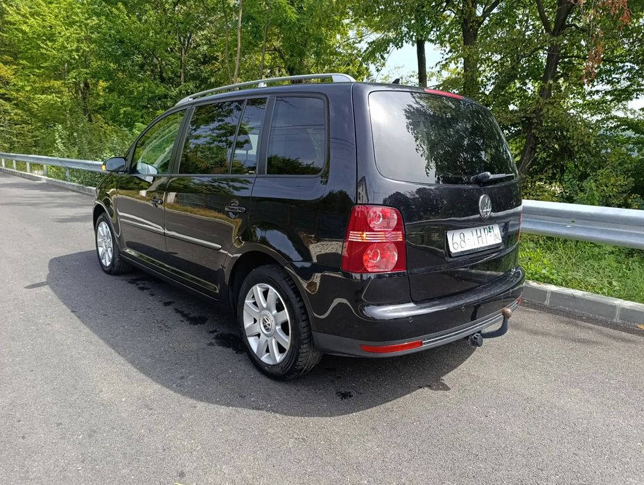Volkswagen Touran 2009 benzină, 2.911 € — imagine 4