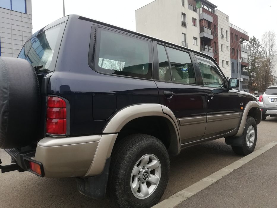 Nissan Patrol Y61, motor 2.8 - 129 cp, 7 locuri, cutie viteze manuala