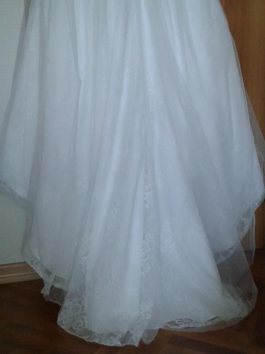 Булчинска рокля DAVID’S Bridal произведена в САЩ.