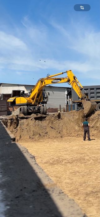 Услуги аренды колесного экскаватора